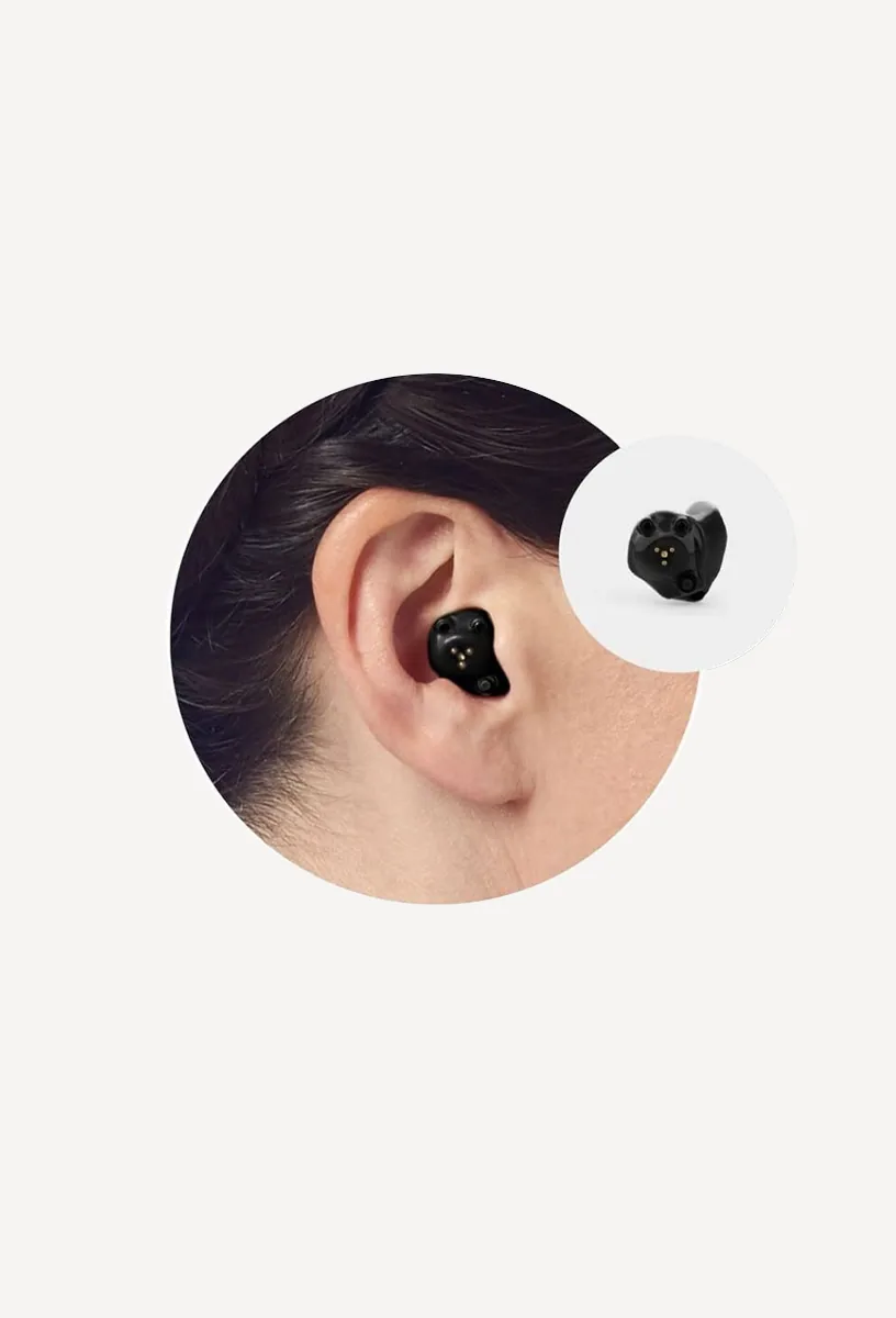 In-the-canal (ITC) Starkey hearing aid being worn